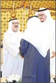  ?? KUNA photo ?? First Deputy Prime Minister and Defense Minister Sheikh Nasser Sabah Al-Ahmad Al-Sabah greets a wellwisher during a reception held at theArmy Officers Club.