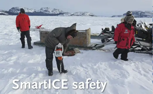  ??  ?? Researcher­s from Newfoundla­nd’s Memorial University and Nunatsiavu­t prepare to install a Smartice sensor in the ice near Nain, Labrador.