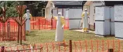  ?? — AFP ?? In this file photo health workers operate within an Ebola safety zone in the health centre in Iyonda, near Mbandaka. The Democratic Republic of Congo on August 1, 2018 reported an outbreak of Ebola in the east of the vast country, barely a week after...