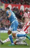  ??  ?? NO PENALTY: Ryan Shawcross slides in on Callum Wilson