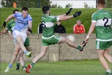  ??  ?? John Kermode fires home a first-half goal for Newtown Blues.