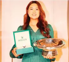  ?? — AFP photo ?? Lee poses with the Rolex Annika Major Award during the LPGA Rolex Players Awards at the CME Group Tour Championsh­ip at Tiburon Golf Club in Naples, Florida.
