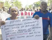  ??  ?? HEAR US: Youths demonstrat­e in Bujumbura, where most people are under 25.