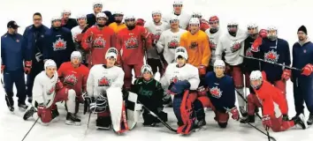  ??  ?? A happy Nathan Rollin (centre front) with the Rockland Nationals, who helped make his dream of playing on his favourite team, in the Central Canada Hockey League, come true. Providing an assist with making Nathan’s dream a reality was the Rockland Optimist Club.