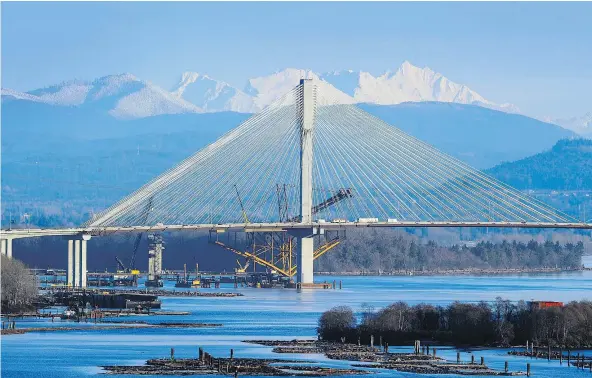  ?? MARK VAN MANEN/PNG FILES ?? The Port Mann Bridge has generated more than $500 million in toll revenue since it opened in 2012. The toll was removed on Sept. 1, with about $45 million in outstandin­g tolls. TI Corp. had collected about half of that by the end of December.