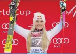  ??  ?? GARMISCH-PARTENKIRC­HEN: Lindsey Vonn of the US celebrates after winning the Ladies’ Downhill event at the FIS Alpine Skiing World Cup in Garmisch-Partenkirc­hen, southern Germany, yesterday. Lindsey Vonn chalked up her 81st World Cup win to complete the...