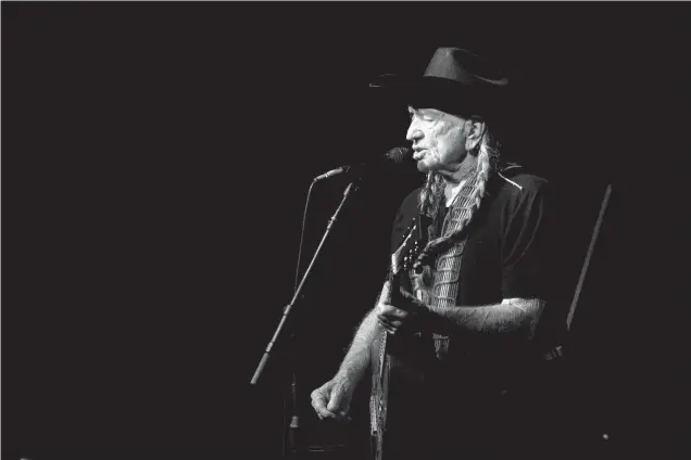  ?? Staff photo by Evan Lewis ?? Willie Nelson is one of many major stars to play Texarkana. Here he performs to a crowed house at the Four States Fair Grounds Oct. 29, 2010.