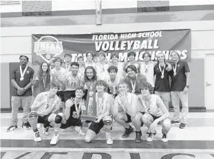  ?? COURTESY ?? The Winter Park’s boys volleyball team poses with the state trophy after winning the 2022 championsh­ip match against Freedom.