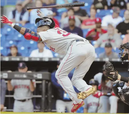  ?? AP PHOTO ?? WATCH OUT: Eduardo Nunez jumps to avoid a pitch thrown by Marlins starter Jose Urena in the second inning of last night’s game in Miami.