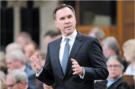  ?? CP PHOTO ?? Finance Minister Bill Morneau speaks during question period in the House of Commons on Parliament Hill in Ottawa on Tuesday.