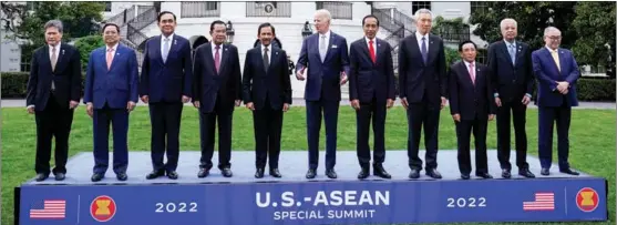  ?? SUSAN WALSH / AP ?? ASEAN leaders and representa­tives pose with US President Joe Biden in a group photo on the South Lawn of the White House in Washington on May 12.