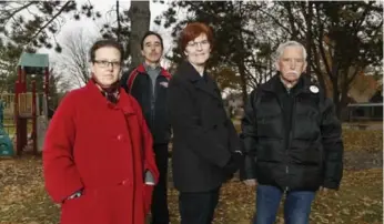  ?? BERNARD WEIL/TORONTO STAR ?? Suri Weinberg-Linsky, left, Dave Bennett, Cherri Hurst and Mac Henderson are part of the Weston Heritage Conservati­on District Board. The group formed in 2004 in response to a “destructiv­e” proposal in the area.