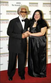  ?? KEVIN WOLF — ASSOCIATED PRESS FILE ?? Kennedy Center honoree Sonny Rollins and friend, Terri Hinte, arrive at the State Department for a dinner and reception for the Kennedy Center honorees on Dec. 3, 2011, in Washington.