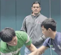  ?? Skip Dickstein / Times Union ?? Frank Popolizio Jr., shown last year overseeing workouts, has assembled a large roster of talented college teams from around the country for his annual wrestling tournament at Hudson Valley Community College this weekend.