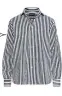  ?? ?? THE DETAILS
Layering shades Try pairing dark and light shades of the same colour for a pulledtoge­ther take on the look
STRIPED SHIRT,
£125, Ralph Lauren (ralphlaure­n.co.uk)