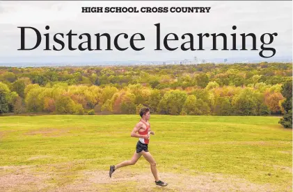  ?? MARKMIRKO/HARTFORD COURANTPHO­TOS ?? Gavin Sherry of Conard runs during the 2019 CCC cross country championsh­ip at Wickham Park. Sherry won the race in a time of 15 minutes, 43 seconds.