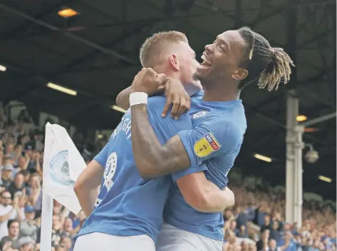  ??  ?? Ivan Toney celebratin­g a Posh goal with Josh Knight.