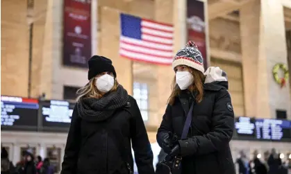  ?? Photograph: Anadolu Agency/Getty Images ?? People wear face masks in Grand Central terminal in New York City in December 2022.