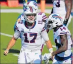  ?? TIMOTHY T LUDWIG/GETTY ?? Josh Allen of the Buffalo Bills celebrates his touchdown pass to Stefon Diggs during the second half.