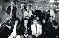  ??  ?? SPOT THE FAMOUS FACE: SIMON PHILLIPS (BACK CENTRE) AT THE 1983 RONNIE LANE APPEAL FOR ARMS BENEFIT CONCERT, WITH PAUL RODGERS, ERIC CLAPTON, RONNIE LANE, ANDY FAIRWEATHE­RLOW, JIMMY PAGE, BILL WYMAN, KENNEY JONES, JEFF BECK, CHARLIE WATTS AND MORE…