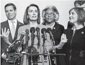  ?? CAROLYN KASTER/AP ?? Nancy Pelosi, center, says Kathy Castor, far right, brings “urgency to the existentia­l threat of the climate crisis.”