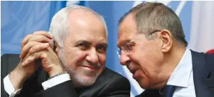  ?? (Denis Balibouse/Reuters) ?? IRAN’S FOREIGN MINISTER Mohammad Javad Zarif and Russian Foreign Minister Sergei Lavrov attend a news conference at the UN in Geneva last month.