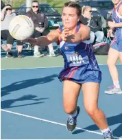  ??  ?? Bunyip wing attack Chloe Papley fires off a pass in the A grade game against Cora Lynn in West Gippsland League. Bunyip won 4230. Photograph­s by Michael Robinson.