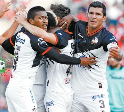  ??  ?? Jugadores de Lobos BUAP festejan