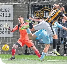  ??  ?? Craig Watson rises to score a late leveller for East Fife.