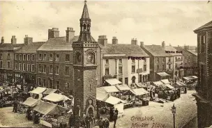  ?? Aughton Street in 1906 showing the White Bull at No 11 with Balmforth’s implements being sold on the market outside ??