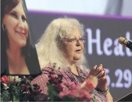  ?? ANDREW SHURTLEFF / POOL / GETTY IMAGES ?? Susan Bro, mother to Heather Heyer, speaks during a memorial for her daughter on Wednesday in Charlottes­ville.