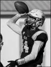  ?? MICHAEL GARD/
POST-TRIBUNE ?? Valparaiso quarterbac­k Chris Duncan tries to launch a pass against Morehead State at Brown Field on Saturday.