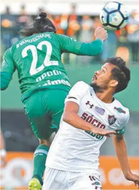  ?? NELSON PEREZ/FLUMINENSE F.C ?? Omeiatrico­lorGustavo­Scarpadisp­utaabolape­loaltocomA­podi