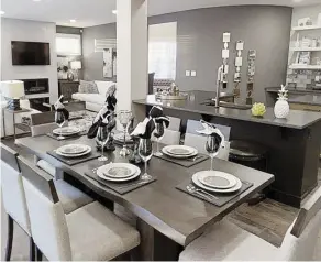  ??  ?? More home buyers are continuing to seek out open-concept designs, combining the kitchen, dining and living areas.