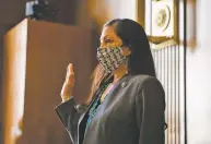  ?? GRAEME JENNINGS ASSOCIATED PRESS ?? U.S. Rep. Deb Haaland, D-N.M., is sworn in Tuesday during a Senate Committee on Energy and Natural Resources hearing on her nomination to be interior secretary.