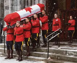  ?? Peter McCabe/Canadian Press via Associated Press ?? The casket carrying the former prime minister Brian Mulroney is taken from St. Patrick’s Basilica on its way to Notre Dame Cathedral in Montreal on Saturday.