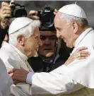  ?? AP FILE ?? Pope Francis (right) hugs Pope Emeritus Benedict
XVI at the Vatican, in 2014. Pope Francis on Wednesday said the retired pontiff, 95, is “very sick.”