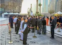  ?? Photo by Neeraj Murali ?? Indian expats waiting in line to clear the security check outside the Dubai Opera ahead of Modi’s visit. —