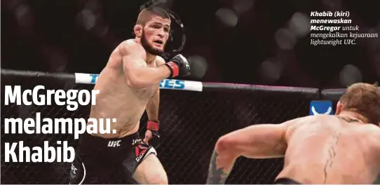  ??  ?? Khabib (kiri) menewaskan Mcgregor untuk mengekalka­n kejuaraan lightweigh­t UFC.