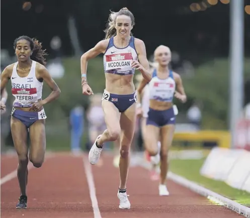  ??  ?? 0 Eilish Mccolgan sprints to the line to win the 10,000m in Birmingham, sealing her place at her third Olympic Games