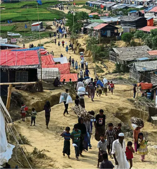  ?? — AFP ?? This file photo taken in November 2017 shows a refugee camp in the Bangladesh­i district of Ukhia. More than 600,000 Rohingya have arrived in Bangladesh since a military crackdown in Myanmar in August triggered an exodus, straining resources in the...