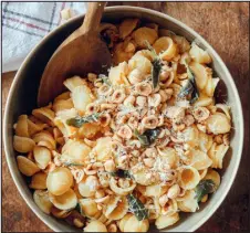  ?? CHRISTOPHE ROUE — ORANGE COUNTY REGISTER ?? Orecchiett­e pasta is served with hazelnuts, sage-infused butter and finely grated Parmesan or Pecorino cheese.