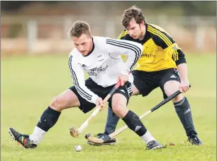  ??  ?? Lovat’s Lorne Mackay is marked by Fort William’s Sean Cruickshan­k.