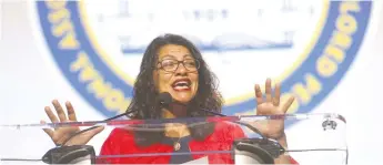  ?? (Rebecca Cook/Reuters) ?? CONGRESSWO­MAN Rashida Tlaib addresses the NAACP convention in Detroit earlier this week.