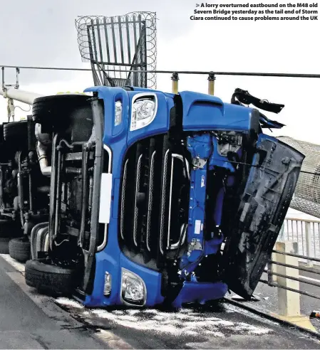  ?? Richard Swingler ?? > A lorry overturned eastbound on the M48 old Severn Bridge yesterday as the tail end of Storm Ciara continued to cause problems around the UK