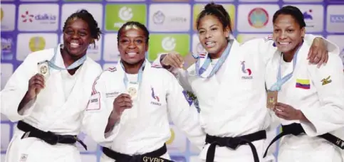  ??  ?? ASTANA: (From left) Spain’s silver medallist Maria Bernabeu, France’s gold medallist Gevrise Emane and bronze medallists France’s Fanny Estelle Posvite and Colombia’s Yuri Alvear pose with their medals following the women’s -70kg category competitio­n...
