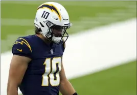  ?? Ashley Landis The Associated Press ?? Justin Herbert has been outstandin­g for the Chargers, despite the fact that he hasn’t been able to lead the team to more wins. L.A. is 2-6 overall and out of the playoffs.