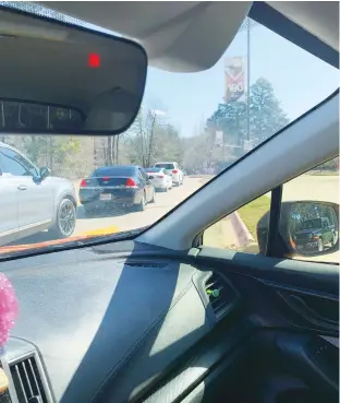  ?? Submitted photo by Eric Duncan ?? ■ A line of cars waits for entry into the CHRISTUS St. Michael Health System campus Saturday in Texarkana, Texas. St. Michael, a state-designated regional vaccinatio­n hub, acknowledg­ed in a statement Tuesday that “several contributi­ng factors” cause long waits at its large-scale vaccinatio­n clinic Saturday, apologized and said it is was working to correct the problems before its clinic next weekend.