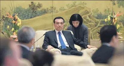  ?? Picture / EPA ?? Premier Li Keqiang is expected to discuss upgrading the 2008 free trade agreement.