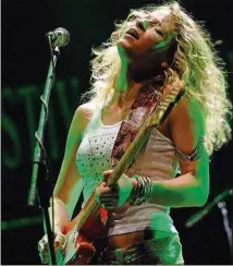  ?? CONTRIBUTE­D ?? Blues guitarist Ana Popovic said Jimi Hendrix’s music was always present in her home growing up.